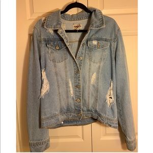 Distressed denim jacket